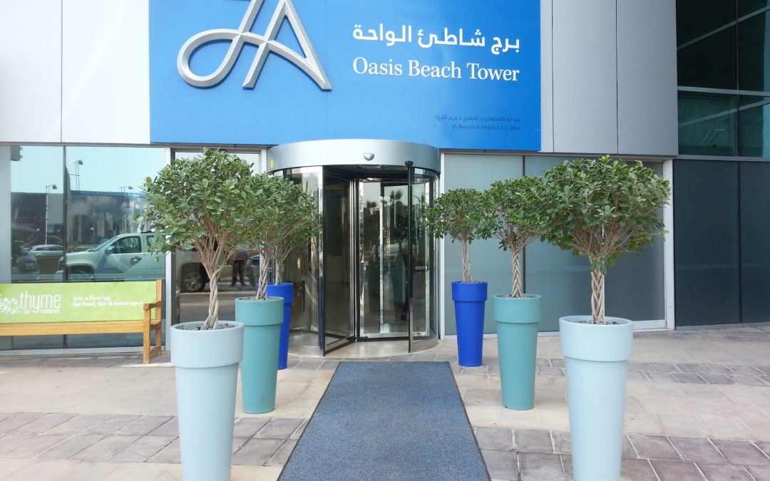 We Love To Put In The Effort To Select The Pot Color To Match Your Company Colors | JA Oasis Beach Tower – Entrance